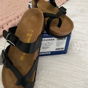 Brand new Birkenstock. Never been worn. Ladies size 9.